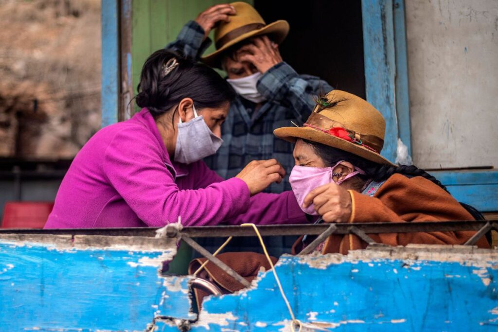 Uma família peruana. Foto: Ernesto Benavides/AFP